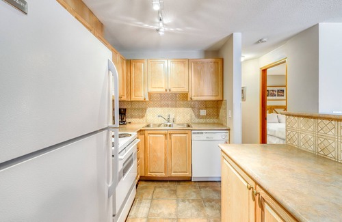 Village North Condo | Ground-floor condo with fireplace & patio - walk or shuttle to ski lifts