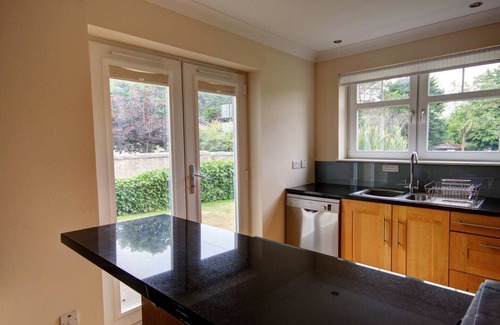 Brora Apartment | Ground floor 2-bedroom apartment overlooking the famous James Braid Brora Golf Course.