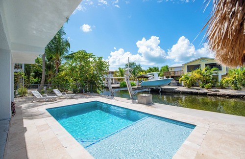 Cutthroat Harbor Estates House | Group Therapy Waterfront Keys Home – Pool, Tiki Hut, Dockage, & Monthly Rentals
