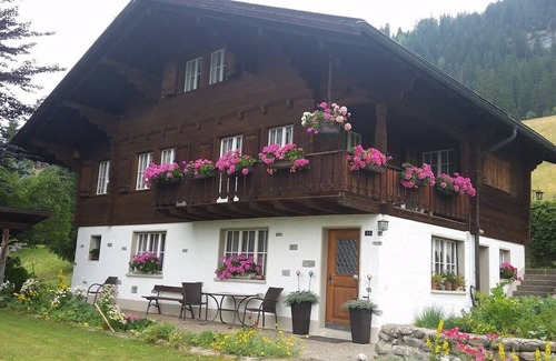 Saanen Ski Chalet | Gstaad Duplex Flat - Amazing Lake Chalet with pond