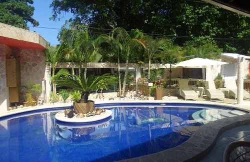 Playa Chiquita Apartment | Guest-friendly suite with jacuzzi, love swing, mirrors, perfect for single men!