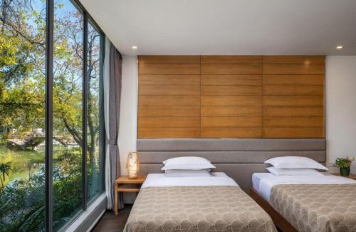 Xiufeng Hotel | Guilin Reed Flute Retreat Free pick-up train station over 2 nights