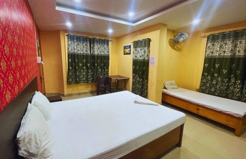 Sualkuchi Hotel | H K Residency Near Kalakshetra