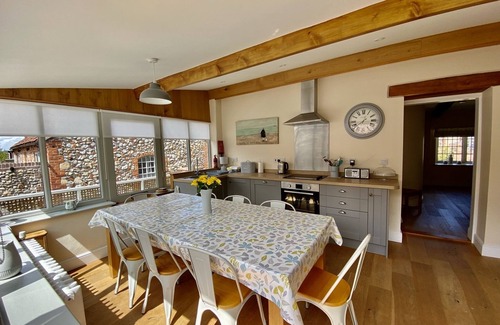 Walsingham House | Half Moon House is a beautifully renovated brick and flint cottage near Wells.