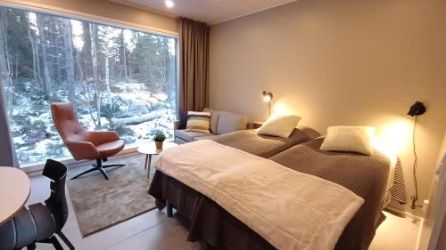 Rukatunturi Ski Chalet | Halla Chalet, Aurora Borealis, ski & lake, free wifi, Vuosseli Resort Ruka
