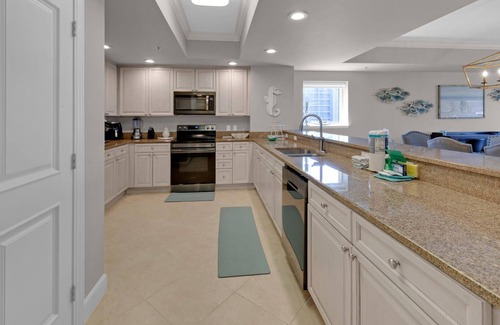 Holiday Isle Condo | Harbor Landing 201B – Spacious Harbor View Condo with Beach Access