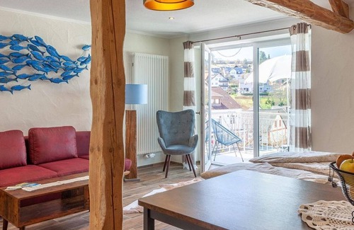 Schalkenmehren Apartment | Hayloft with balcony and view of the Maar for 1-2 persons. - Hof Krebs, vacation apartments