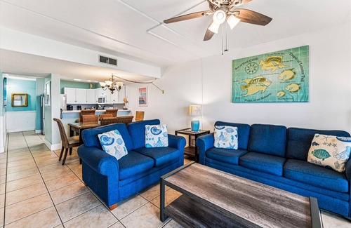 St. George Island Condo | HEAR THE ROAR of the ocean and the slow flapping of the blue herons.