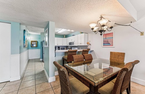 St. George Island Condo | HEAR THE ROAR of the ocean and the slow flapping of the blue herons.