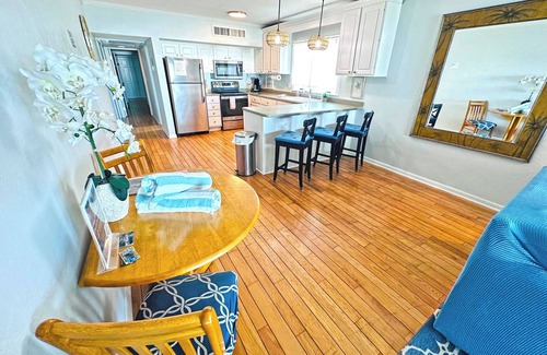 Independence Square Apartment | Heart of Indian Rocks Beach on the Sand Balcony Sunset Views
