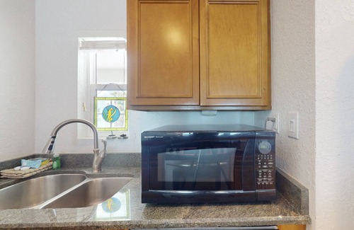 Pass-a-Grille Historic District Condo | Heart of Pass-A-Grille Beach! Beach Across the Street ~ Community Heated Pool ~ Beach-facing Balcony