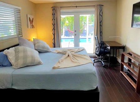 Cutler Bay Villa | heated pool village Boat Parking WiFi BBQ private duplex