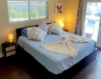 Cutler Bay Villa | heated pool village Boat Parking WiFi BBQ private duplex