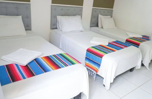 Covenas Hotel | Hermosa Habitacion Basica Triple A Pie De Playa