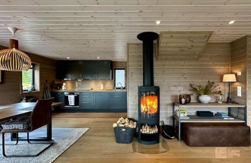 Sjusjoen House | High standard cabin at Sjusjøen sauna, hot tub & ski trails right outside