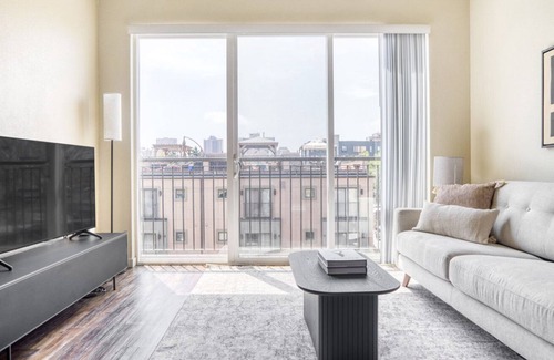 City Park West Apartment | Hip Uptown 1BR w/ W/D & Juliette balconies, near Zoo, by Blueground