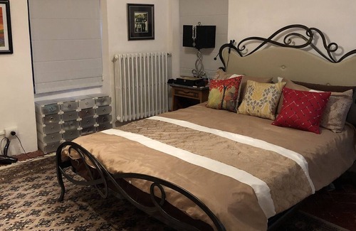 Colmurano House | Historic Village Townhome with Rooftop Terrace