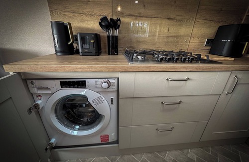 Longridge Cabin | Hobbit - House Of The Owl.nLuxury lodge with views. Pet friendly. Indoor Pool.