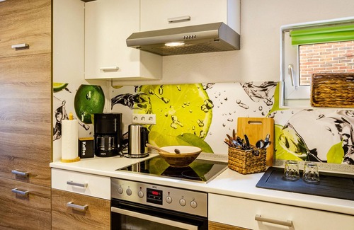 Wiesmoor Apartment | Holiday Apartment "Am Golfplatz" with Private Terrace