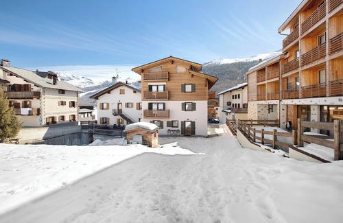 San Rocco Apartment | Holiday Apartment 'Baita Doss' with Mountain View, Balconies & Wi-Fi