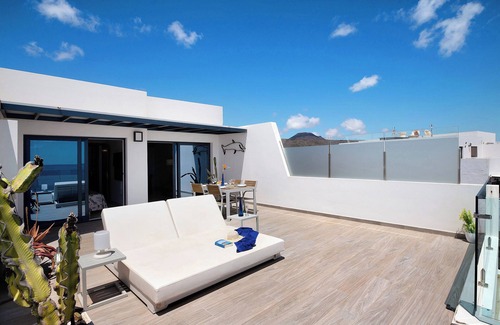 Arrieta Apartment | Holiday Apartment “Callao Beach 6” with Sea View, Terrace & Wi-Fi