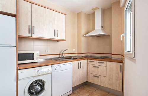 Conil de la Frontera City Center Apartment | Holiday Apartment "Casa Señores Cura 1 - Solo Familias" with Shared Terrace & Wi-Fi