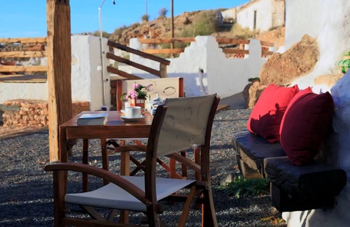 Los Balcones House | Holiday Home 'Cuevas Balcones de Piedad - Pita' with Terrace, Shared Pool & Wi-Fi