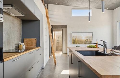 Hvidbjerg Strand House | Holiday Home Elvie - 150m from the sea by Interhome