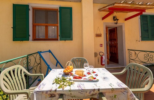 Fauglia House | Holiday Home 'Poggio1' with Shared Pool, Shared Garden and Wi-Fi
