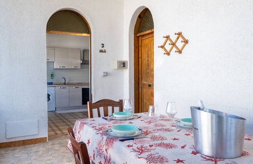 Sant'Isidoro House | Holiday Home 'Villa Gaudì - Milà' with Private Terrace, Wi-Fi and Air Conditioning
