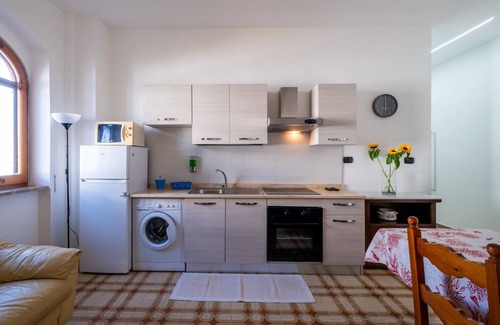 Sant'Isidoro House | Holiday Home 'Villa Gaudì - Milà' with Private Terrace, Wi-Fi and Air Conditioning