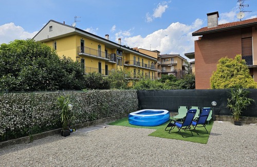 Arona House | Holiday Home 'Villa Lilia Appartamento Blu' with Shared Garden, Balcony and Wi-Fi