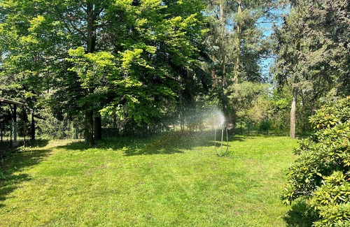 Briesensee House | Holiday Home 'Waldhaus Am See' with Private Terrace, Private Garden and Wi-Fi