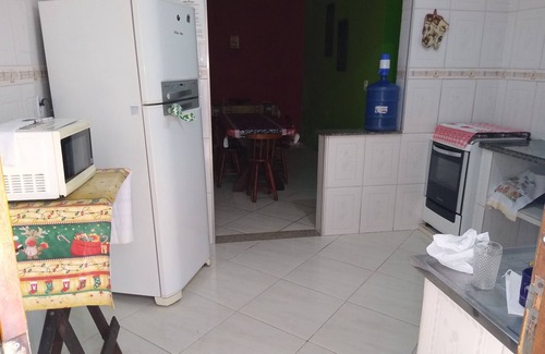 Mongagua House | Home with pool and games room, airy and comfortable, close to the beach.