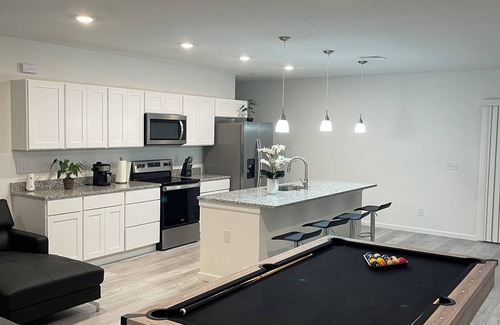 Port Malabar House | Home with Pool Table: Nature, Tranquility, close the Beach, Lake, USSSA.