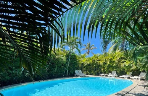Sainte-Rose House | Homerez - House for 2 ppl. with shared pool, garden and terrace at Sainte-Rose