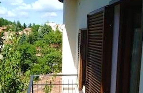 Monticello Amiata Apartment | Homerez - Spacious apartment with garden and balcony