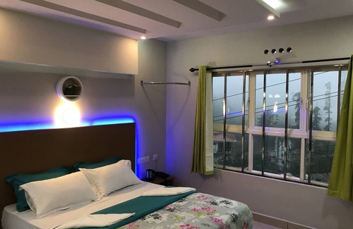Munnar Bed & Breakfast | HomeStay Munnar-MehaKira Holiday Inn