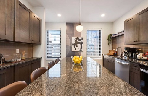 Central Northside House | ★ HostWise Stays ★ 3 King Beds! Garage! Theater! Great Location!
