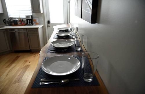 Lower Lawrenceville House | ★ HostWise Stays ★ Off-Street Parking, <1 block from Butler, Patio, Great Space!