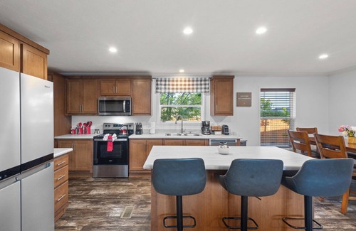 Dupont House | HOT TUB - Entire NEW Home - Walk to Light Rail - King Beds - Firepit Theatre