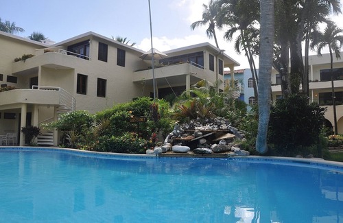Cabarete Apartment | Hotel suite in beachfront luxury resort near shops and dining, TV/AC/Wi-Fi/pool