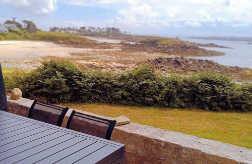 Berven House | House ball with a view of the sea, surrounded by greenery, out of sight
