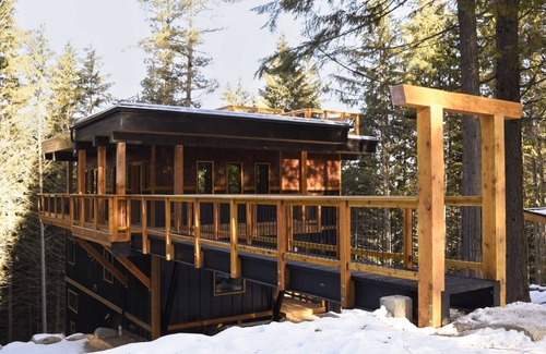 Rossland House | House with bridge, walk around deck, rooftop patio, 24' glass door & much more!