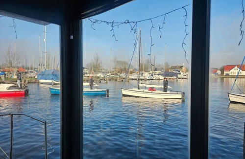 Heeg Boat Rental | Houseboat in Heeg with Stunning Marina Views