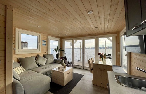 Luebeck Boat Rental | Houseboat Janne Lübeck Including canoe, SUP and WLAN 50 MBit s Flat