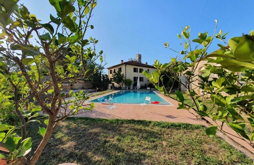 Monteriggioni Villa | Idyllic Countryside Retreat with Rustic Elegance