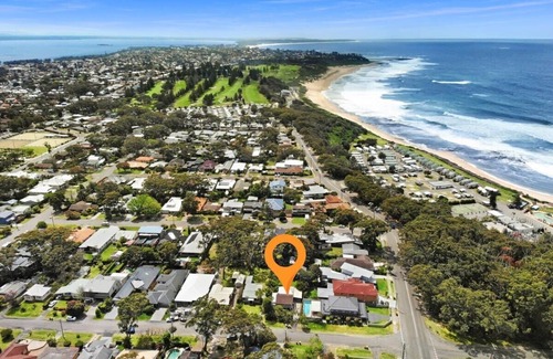 Bateau Bay House | Immaculate Beachside Home with Fireplace and Patio