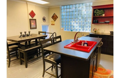 Sedalia Villa | Immaculately Remodeled Historic building and Greenhouse with fire pit