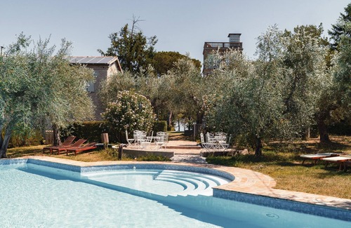 Santa Veneranda Apartment | In a historic farmhouse in the hills, with garden and pool, perfect for families